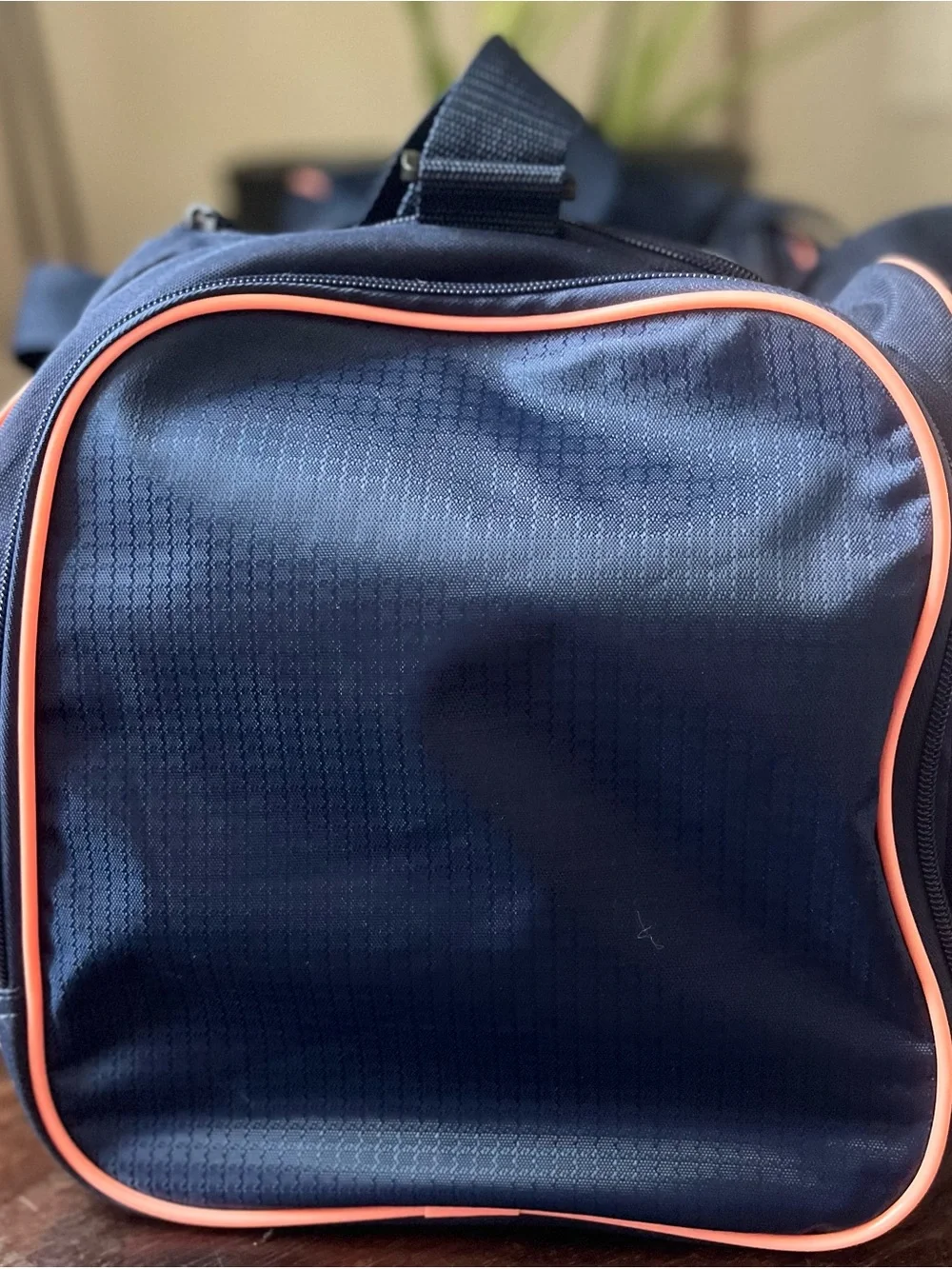 Puma Navy Duffel Bag with Coral Logo Accents